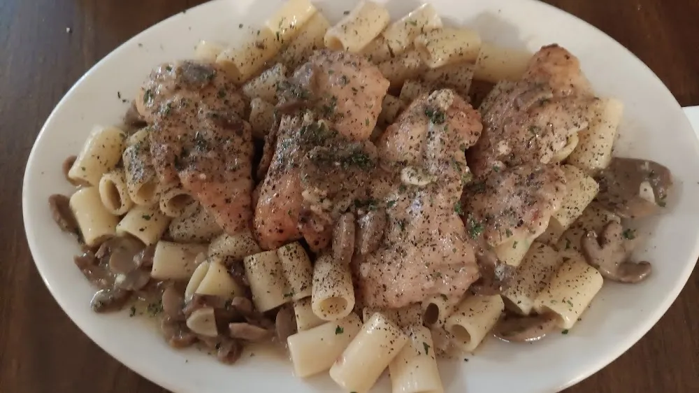 Chicken Strips with Wine and Mushrooms over Rigatoni